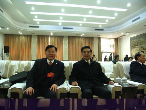 王董與最高人民法院院長、原湖南省省長周強在一起